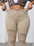 THE "RIPPED & UNBOTHERED" KHAKI JEANS