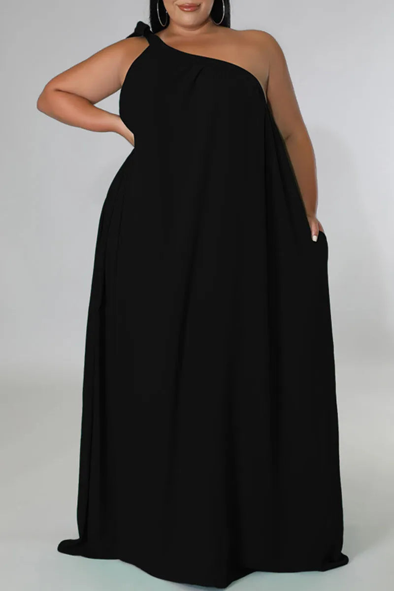 THE "UNBOTHERED & BOOKED" MAXI DRESS