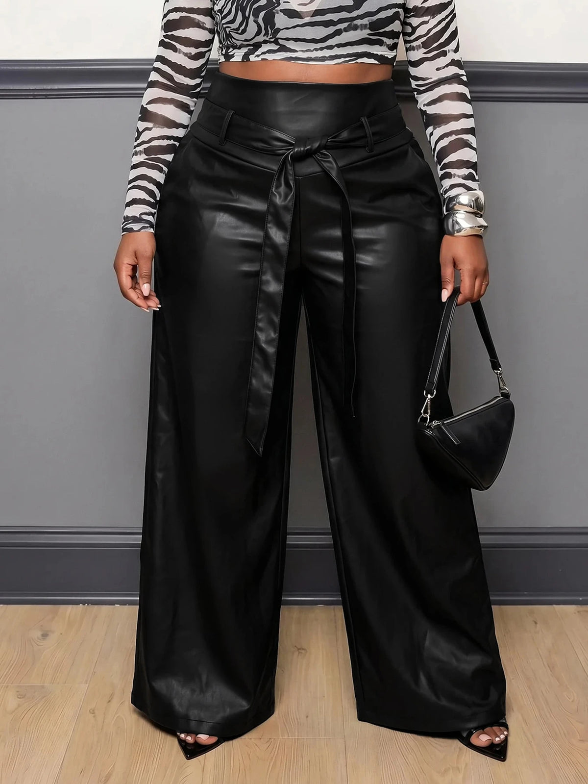 THE "BLACK OUT" FAUX LEATHER WIDE LEG PANTS