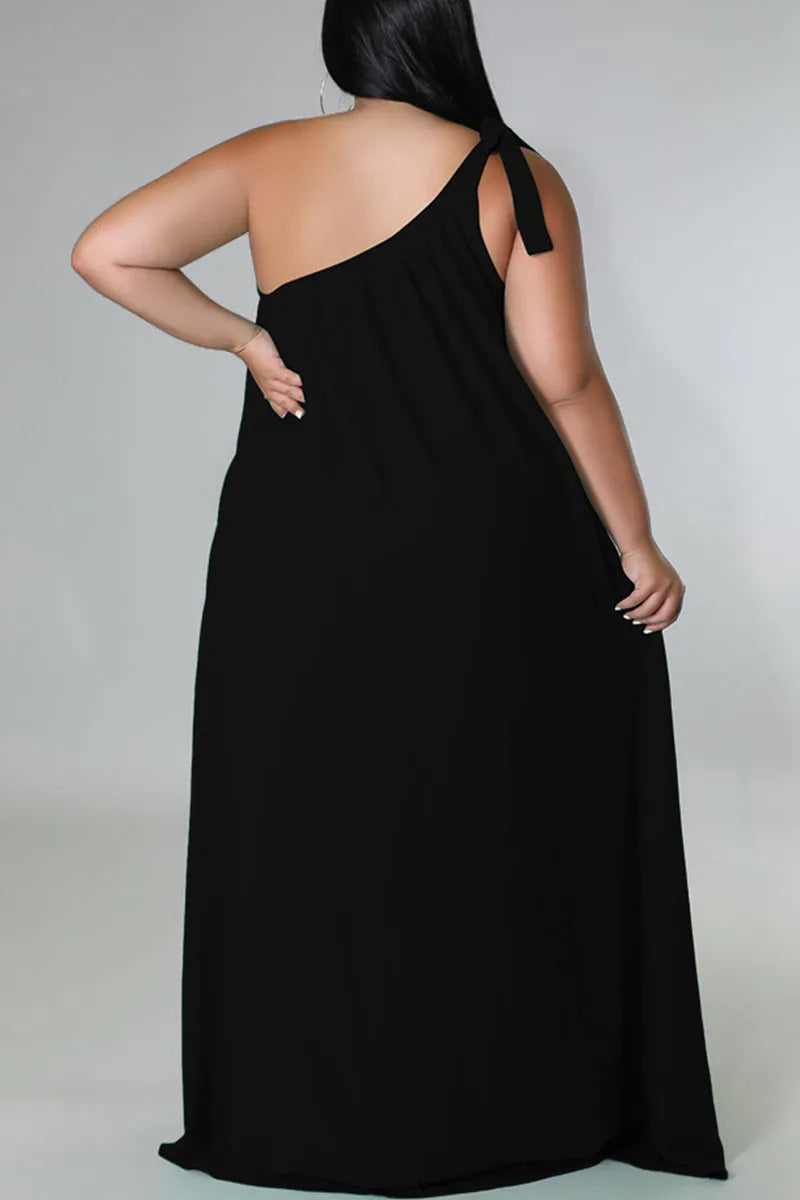 THE "UNBOTHERED & BOOKED" MAXI DRESS