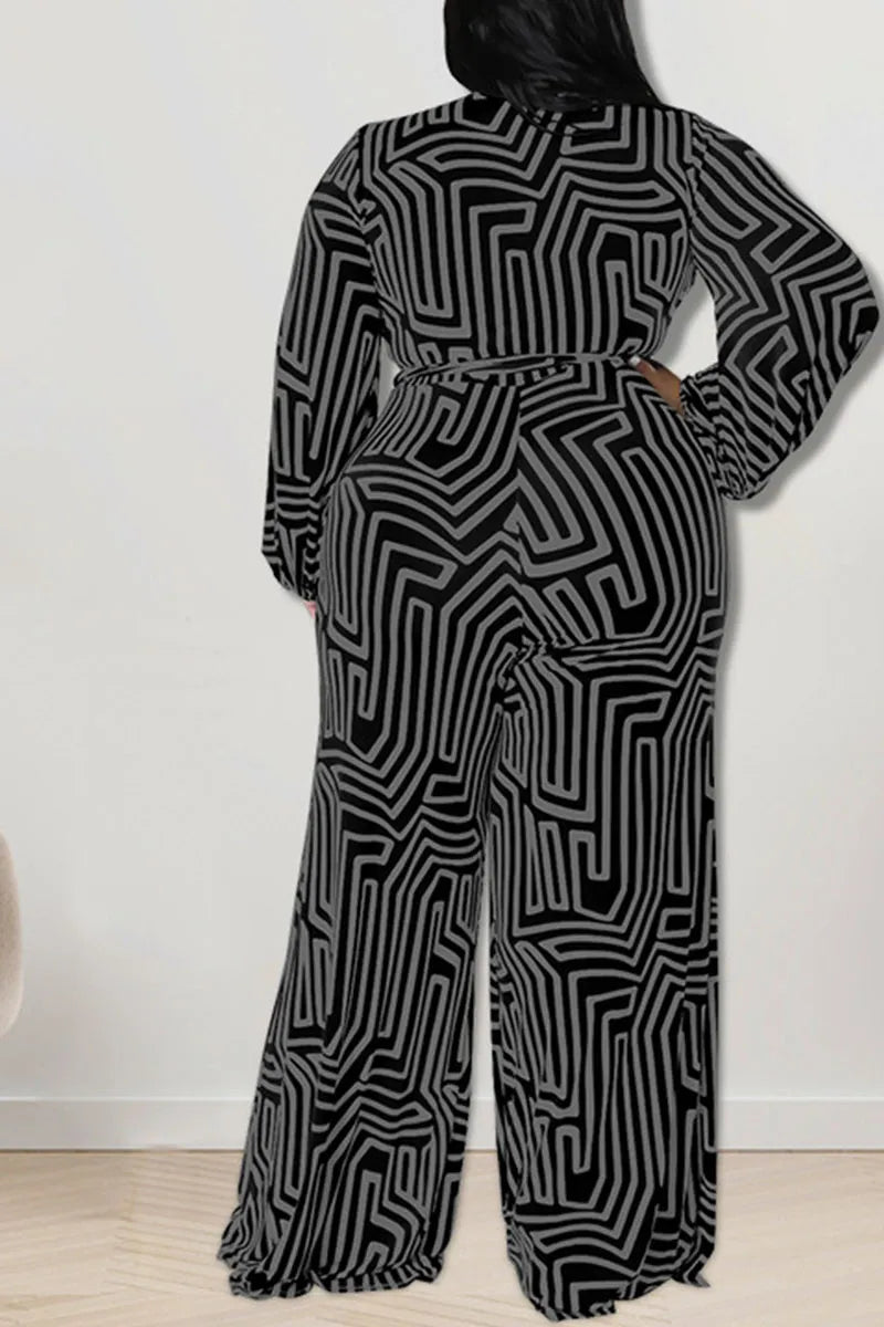THE "MAKE EM DIZZY" WIDE LEG JUMPSUIT