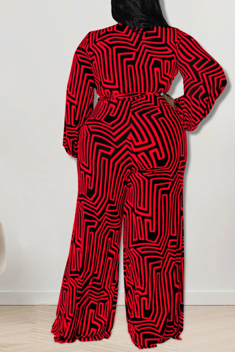 THE "MAKE EM DIZZY" WIDE LEG JUMPSUIT