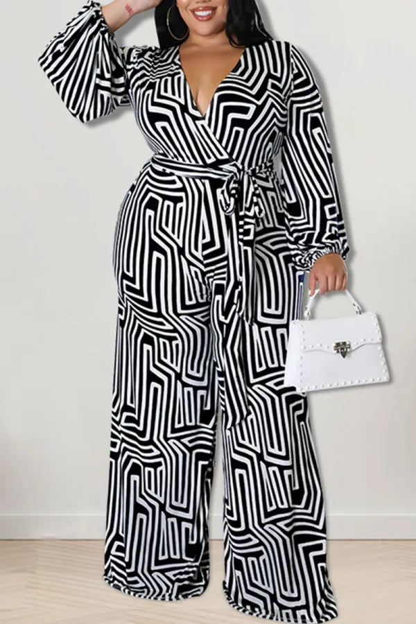 THE "MAKE EM DIZZY" WIDE LEG JUMPSUIT