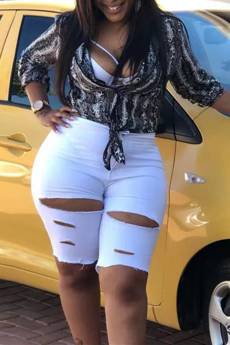THE "OUTSIDE BEHAVIOR" JEAN BIKER SHORTS