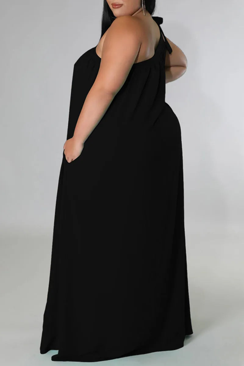 THE "UNBOTHERED & BOOKED" MAXI DRESS