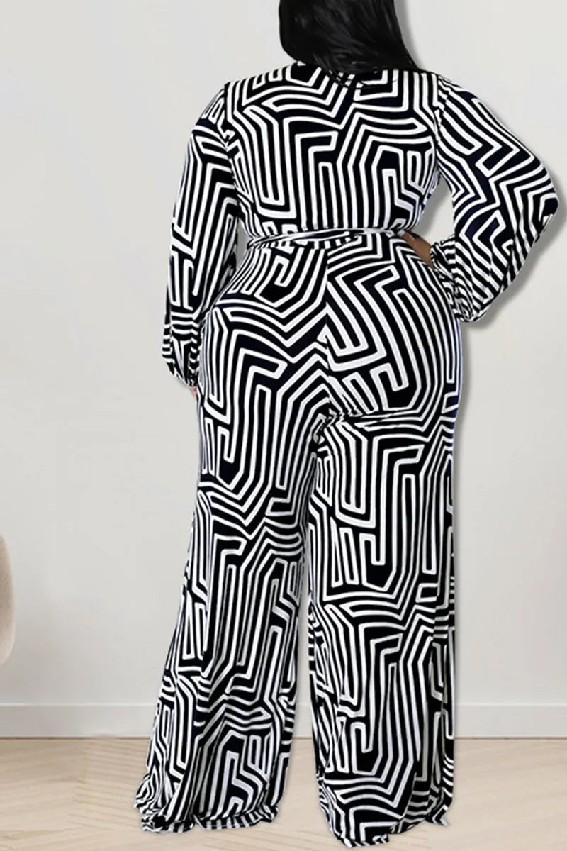 THE "MAKE EM DIZZY" WIDE LEG JUMPSUIT